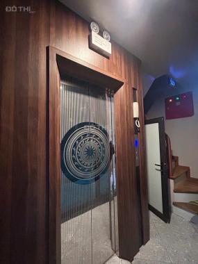 Nhà mới 8 tầng thang máy oto đỗ cổng ngay sau Trung tâm HNQG nhỉnh 11 tỷ