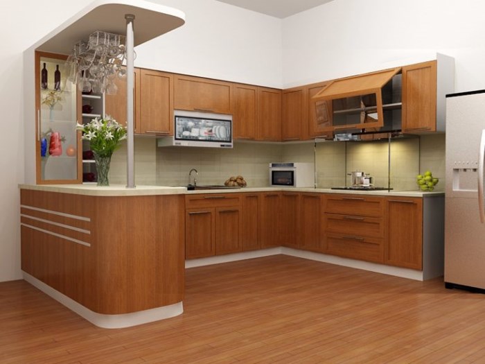 Tủ bếp và sàn gỗ cùng màu tạo nên một tổng thể hài hòa cho không gian nấu nướng.
