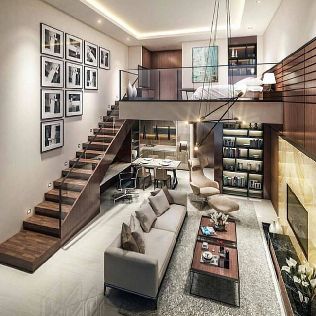Hình ảnh mẫu thiết kế phòng khách hiện đại có cầu thang gỗ nhỏ gọn dẫn lối lên gác lửng