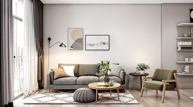 Hình ảnh phòng khách căn hộ 30m2 với sofa ghi, tranh tường đơn giản, rèm cửa màu trắng mỏng mảnh