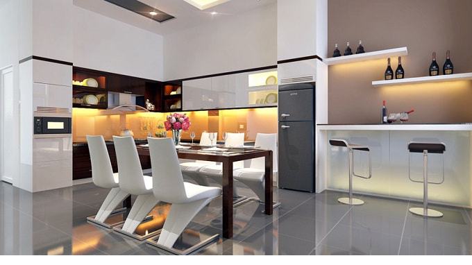 Hình ảnh phòng bếp hiện đại, đa năng kiêm khu vực ăn uống, quẩy bar, sử dụng đèn vàng tạo điểm nhấn ấm áp