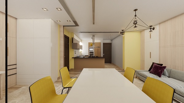 Hình ảnh toàn cảnh phòng bếp liên thông bàn ăn, kết nối bằng điểm nhấn màu vàng nổi bật