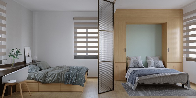 Hình ảnh toàn cảnh phòng ngủ gồm 2 giường gỗ có ngăn kéo lưu trữ, bàn học đặt cạnh cửa sổ, cây xanh trang trí, vách kính mờ