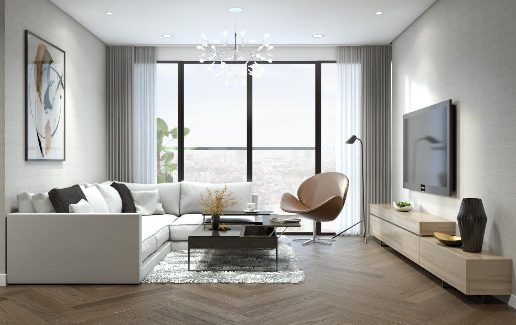 Hình ảnh phòng khách rộng rãi với ghế sofa màu trắng, tranh tường trừu tượng, đối diện là tủ kệ tivi bằng gỗ, cửa sổ kính