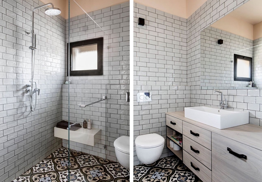 Hình ảnh toàn bộ tường phòng tắm được ốp gạch màu trắng tạo cảm giác sạch sẽ, thoáng rộng hơn.