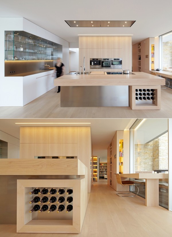 Hình ảnh cận cảnh kệ rượu vang trong phòng bếp hiện đạiHình ảnh toàn cảnh phòng bếp với hệ tủ màu đen cá tính, đảo bếp vát nhọn sắc nét