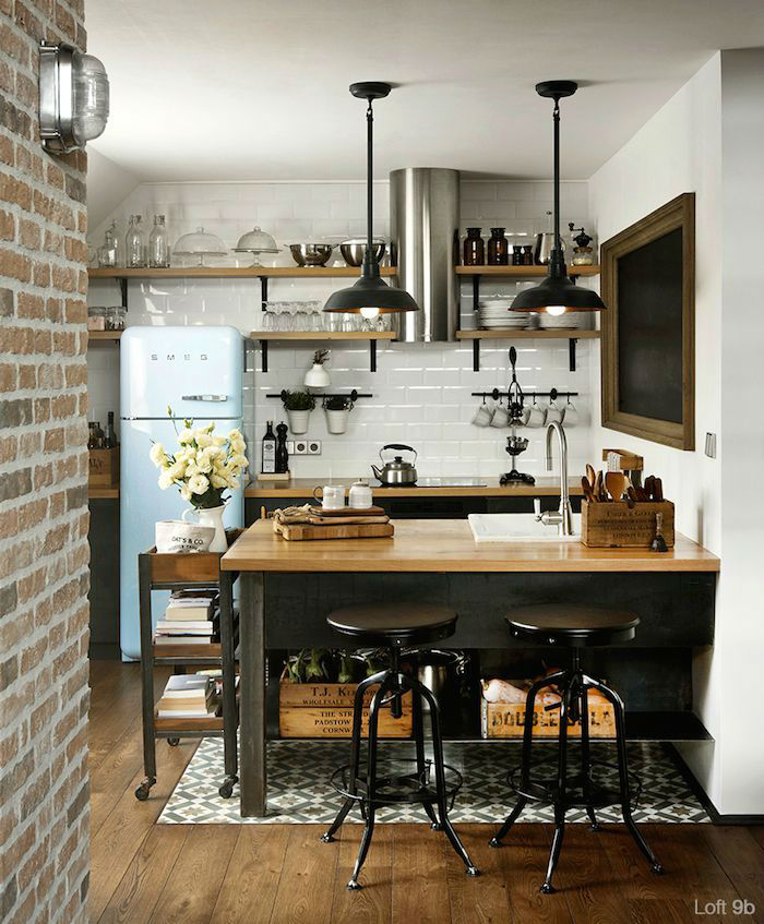 Hình ảnh phòng bếp Bắc Âu nổi bật với nội thất gỗ, tường gạch trần, đèn thả và ghế bar phong cách công nghiệp