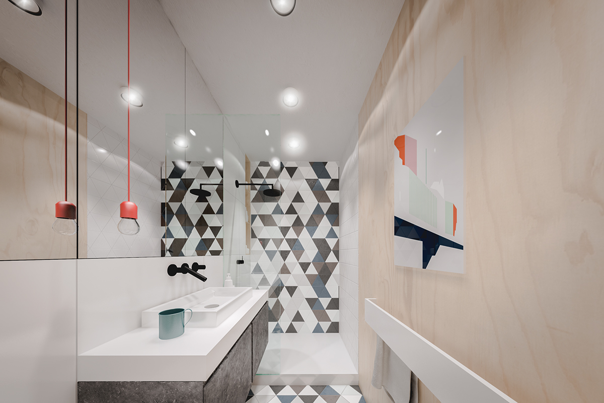 hình ảnh trong căn hộ 20m2, phòng tắm tuy chật hẹp nhưng được thiết kế cực chất với bức tường ốp gạch họa tiết hình học cá tính, nhấn nhá đèn thả màu đỏ cực nổi bật.