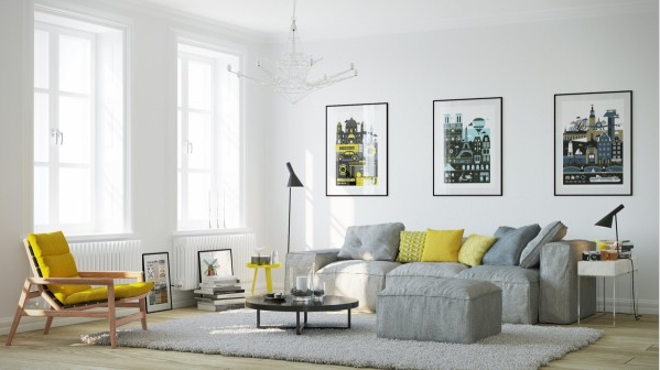 Hình ảnh phòng khách phong cách Bắc Âu với những điểm nhấn màu vàng tươi trẻ từ ghế thư giãn, gối tựa sofa, bàn phụ khiến phòng khách như bừng sáng