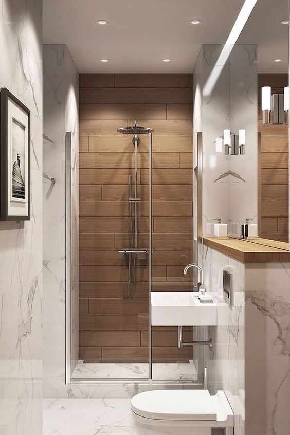 Hình ảnh phòng tắm nhà ống 3 tầng kết hợp kinh doanh với sàn và tường ốp đá cẩm thạch sang trọng