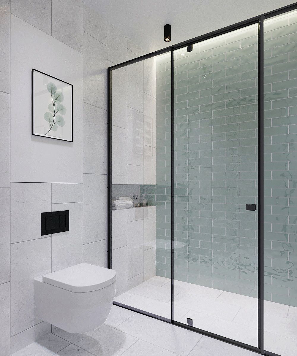 Hình ảnh phòng tắm nhỏ sang trọng với gạch ốp lát màu sáng, tranh tường họa tiết lá tinh tế
