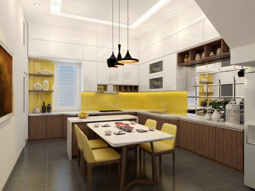 Hình ảnh bếp nấu và phòng ăn được thiết kế gọn gàng, khoa học với tủ bếp màu trắng kịch trần, mảng tường màu vàng ấm áp, bàn ăn 4 ghế, đèn thả trần màu đen nổi bật