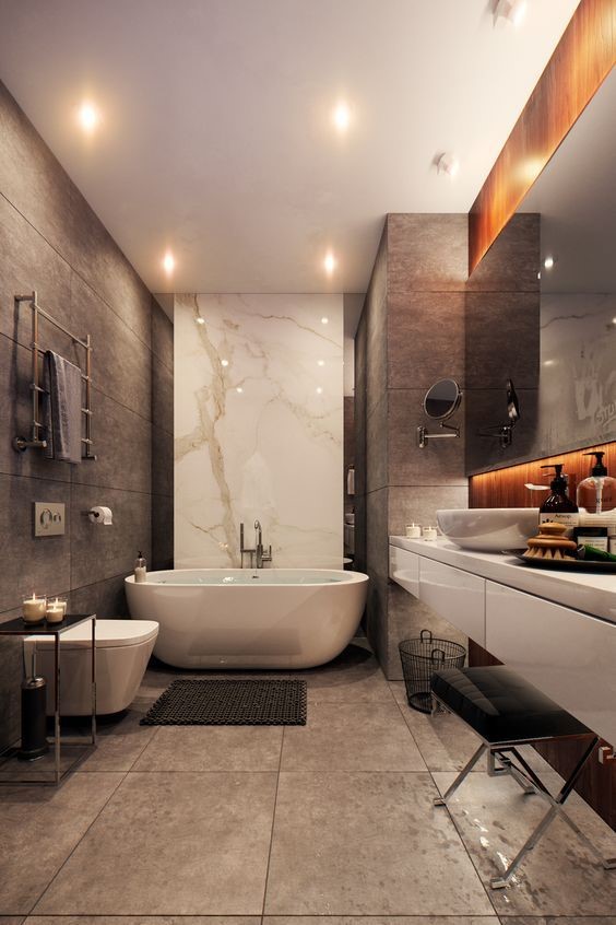 Hình ảnh phòng tắm trong biệt thự 2 tầng phong cách hiện đại với gạch ốp lát màu xám, bồn tắm lớn