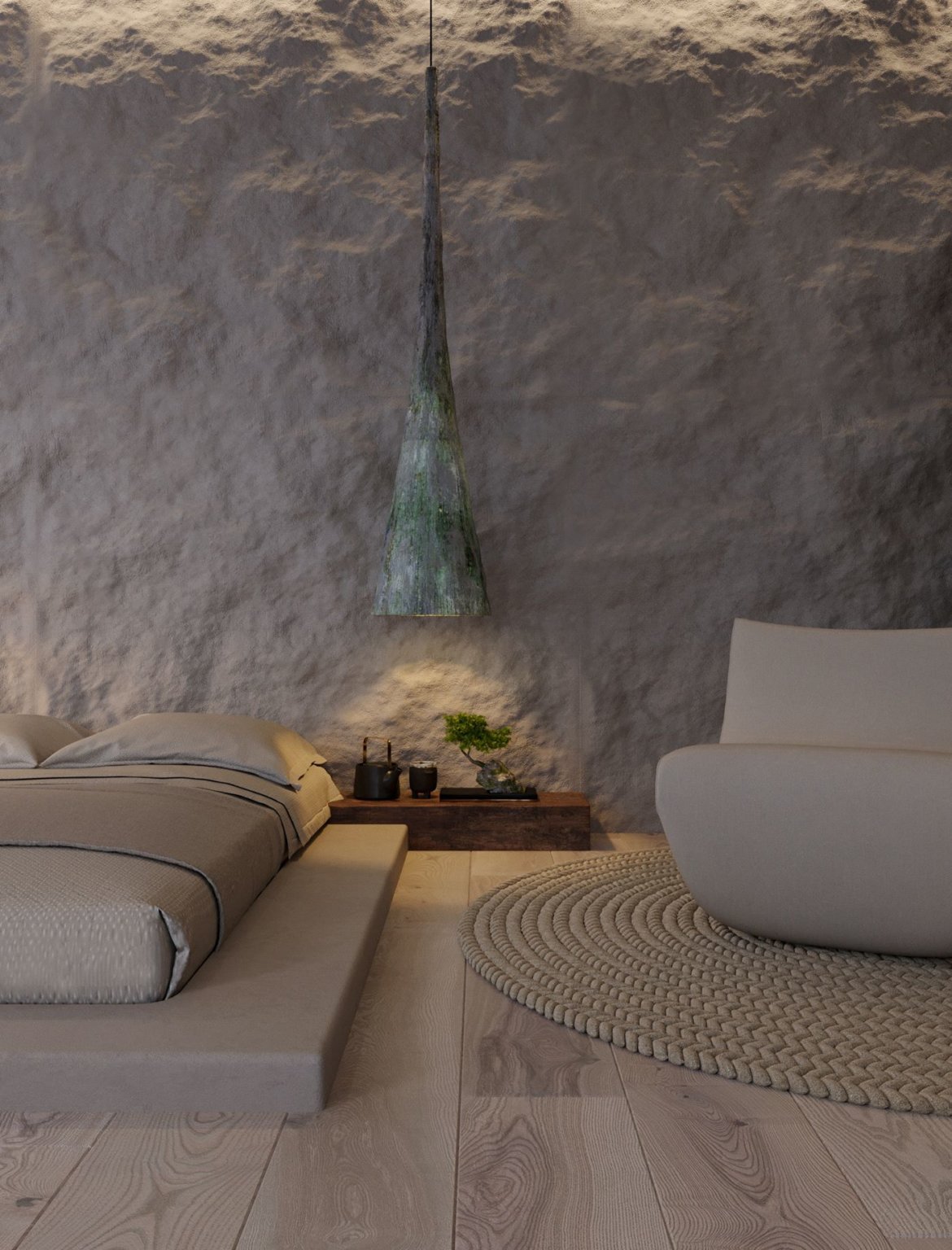 hình ảnh phòng ngủ trong căn hộ Wabi-sabi với giường thấp, kệ gỗ đầu giường, đèn thả, chậu bonsai nhỏ, thảm tròn, ghế ngồi 