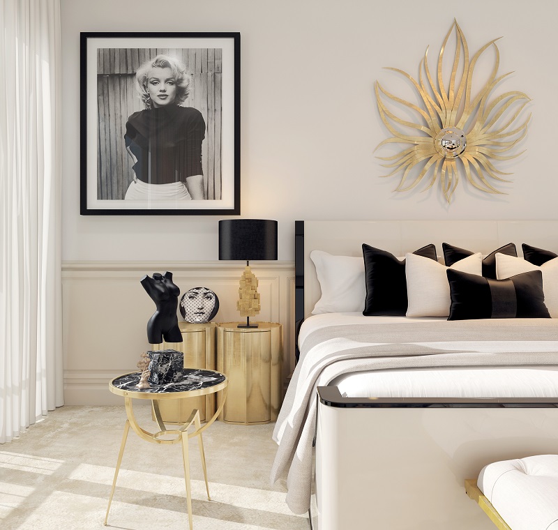 hình ảnh phòng ngủ phong cách Art Deco ấn tượng với phụ kiện trang trí đầu giường hình mặt trời tỏa nắng, tranh chân dung cô gái màu đen trắng, bàn trà tròn