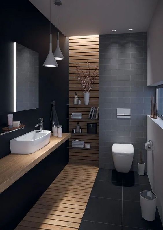 hình ảnh phòng vệ sinh trong nhà ống 2 tầng với tường sơn đen, đèn thả, chất liệu gỗ nhấn nhá