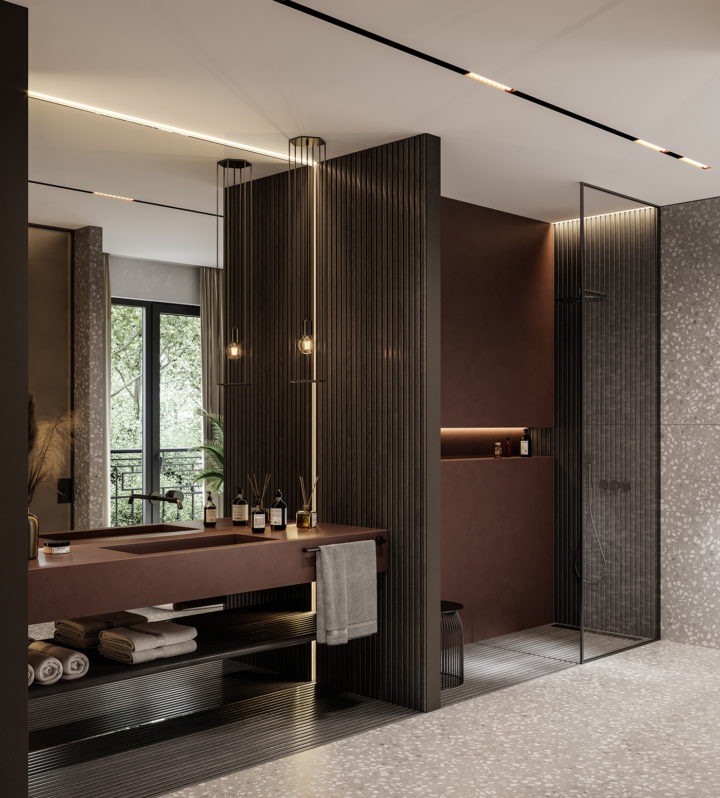 hình ảnh một góc phòng tắm tông màu trầm chủ đạo, nổi bật với gương lớn gắn trên bồn rửa mặt giúp nhân rộng không gian hiệu quả