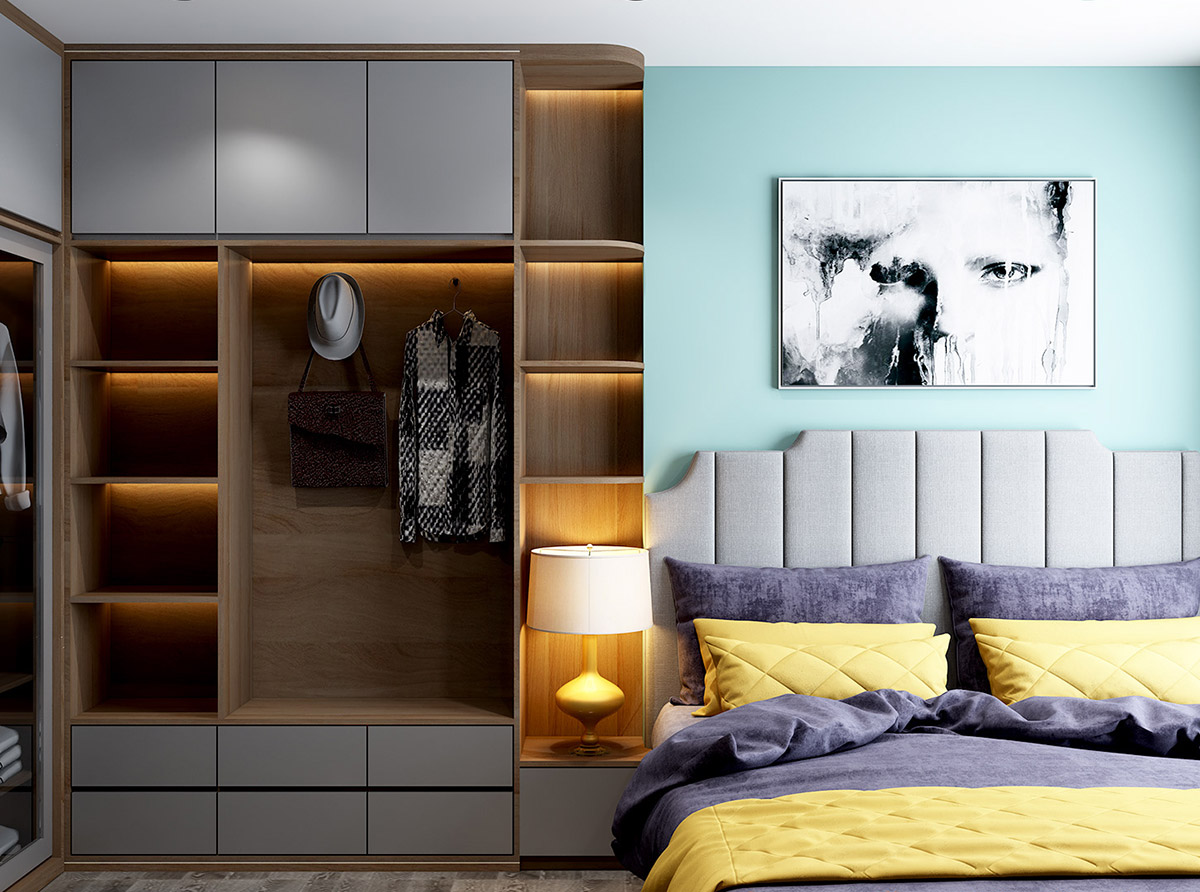 hình ảnh một góc phòng ngủ với tường đầu giường sơn xanh, ga gối màu tím, vàng chanh, cạnh đó là tủ quần áo tiện nghi