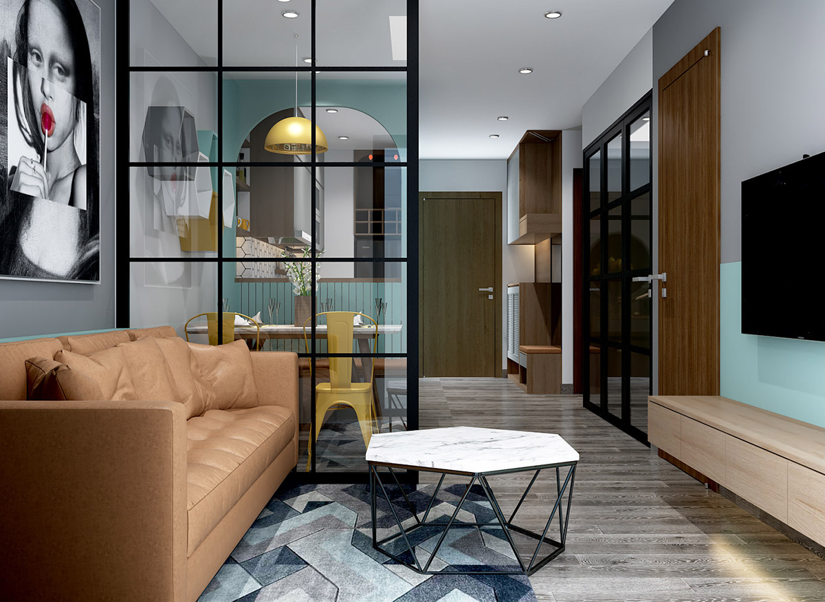 hình ảnh không gian bên trong căn hộ nhỏ với sofa màu vàng da bò, tranh treo tường ấn tượng, vách kính trong suốt
