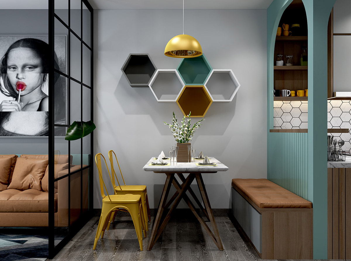 hình ảnh phòng ăn gọn xinh trong căn hộ nhỏ với băng ghế dài, ghế công nghiệp màu vàng chanh, đèn thả cùng tông màu, kệ tổ ong gắn tường