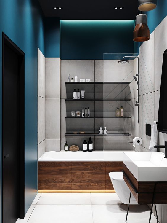 hình ảnh phòng tắm nhà vườn 1 tầng với sơn tường màu xanh dương đậm, kệ lưu trữ gắn tường