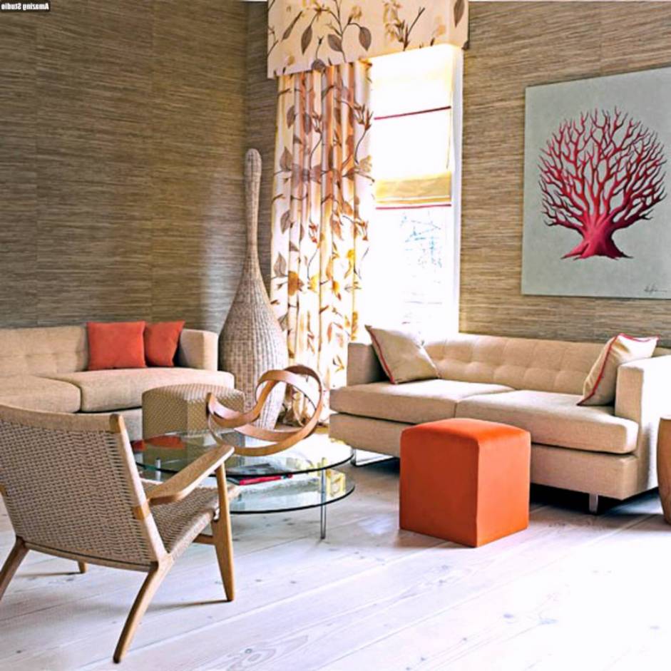 hình ảnh phòng khách hiện đại với điểm nhấn màu đỏ, cam từ tranh tường, đôn ngồi, gối tựa