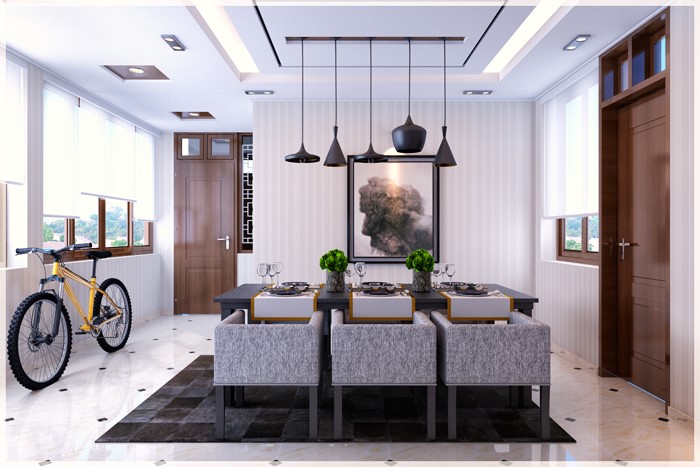 hình ảnh toàn cảnh phòng bếp ăn với tủ bếp hiện đại, bàn ăn sang trọng, đèn thả màu đen, cạnh đó là xe đạp