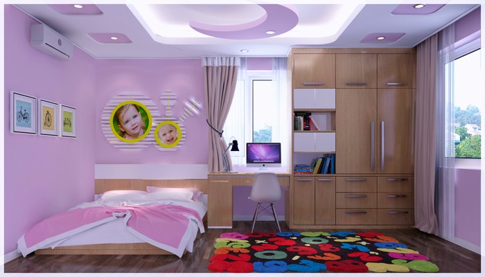 hình ảnh phòng ngủ bé gái tông màu hồng tím nữ tính, bàn học và tủ quần áo đặt gần cửa sổ kính