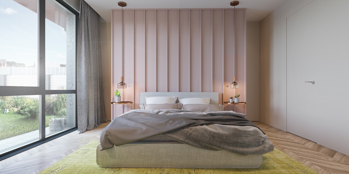 hình ảnh phòng ngủ mùa hè với tường đầu giường màu hồng, giường và rèm cửa màu xám, thảm trải màu xanh lá cây