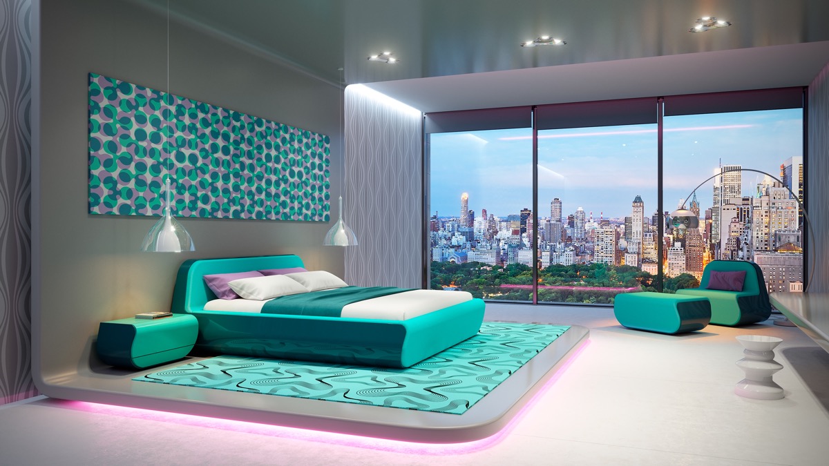 hình ảnh phòng ngủ rộng rãi với ga gối, tranh tường, ghế thư giãn màu xanh ngọc, cửa kính lớn trong suốt