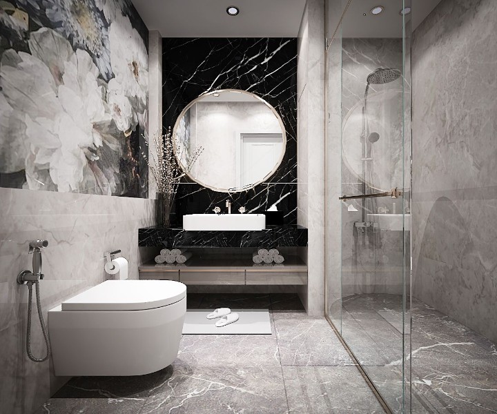 hình ảnh phòng tắm trong nhà ống 2,5 tầng với gươn tròn lớn, tranh treo tường nghệ thuật, vách tắm kính phân chia giữa buồng tắm vòi sen và khu vệ sinh bên ngoài