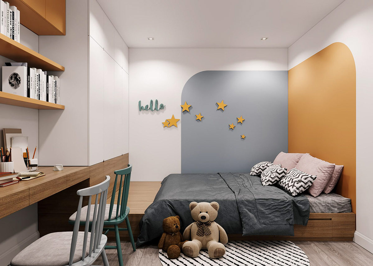 hình ảnh phòng ngủ của bé của tường đầu giường màu vàng, cạnh đó là tường xám, trang trí họa tiết ngôi sau, tủ kệ gắn tường