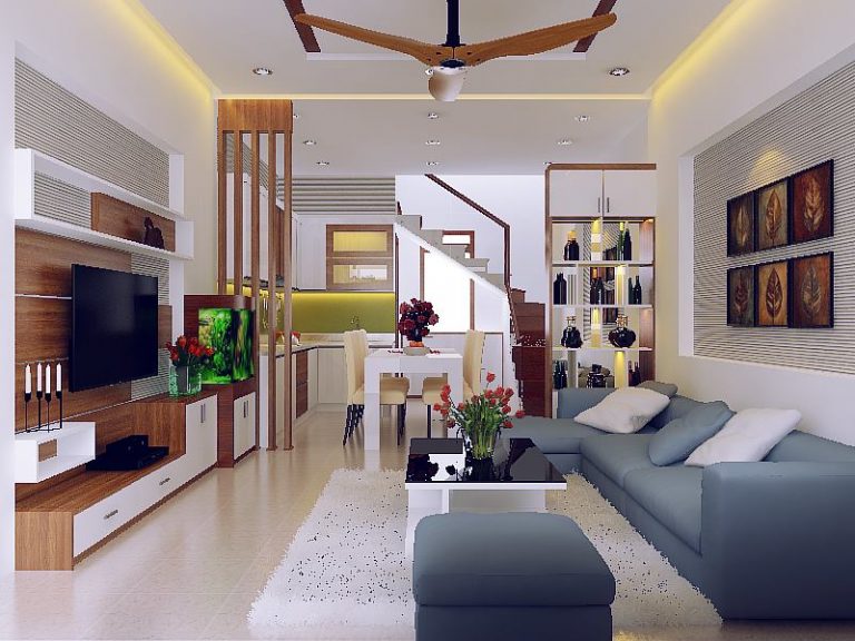 hình ảnh phòng khách nhà ống 3 tầng được thiết kế theo phong cách hiện đại với điểm nhấn là bộ ghế sofa màu xanh xám trẻ trung, thanh lịch.
