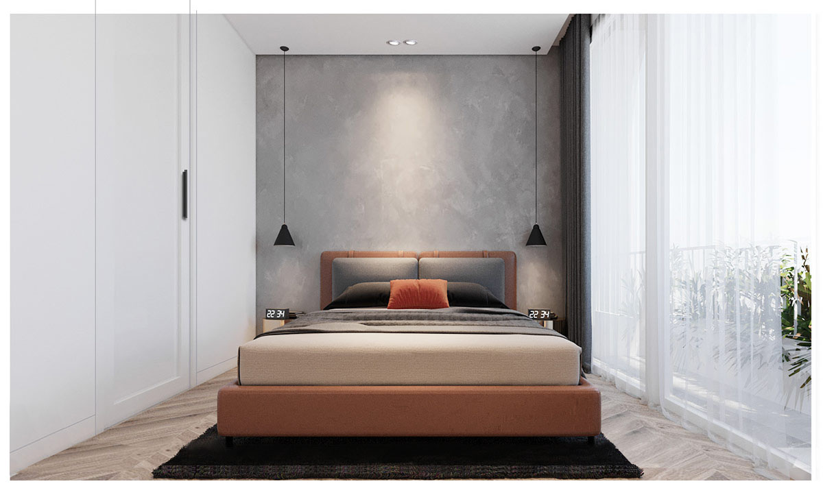 hình ảnh phòng ngủ phong cách đương đại bên trong ngôi nhà Việt với giường gối màu cam đất, đèn thả đối xứng màu đen, tủ trắng, cửa sổ kính lớn