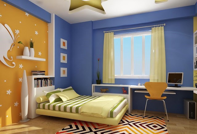 hình ảnh gam màu vàng từ giấy dán tường, thảm trải, rèm cửa... mang đến cái nhìn mới lạ cho không gian phòng ngủ của cậu con trai.