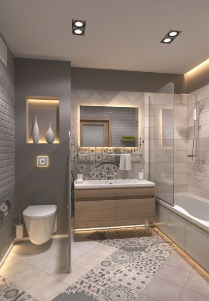 Không gian phòng tắm nhà ống 2 tầng sử dụng gam màu xám trung tính chủ đạo kết hợp gạch lát hoa văn sinh đông. 