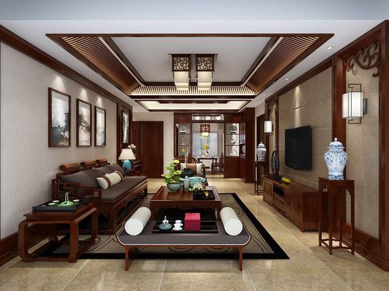 Không gian phòng khách là sự kết hợp hoàn hảo giữa các yêu tố hiện đại và truyền thống với nội thất gỗ sẫm màu tạo cảm giác ấm áp, thân thiện.