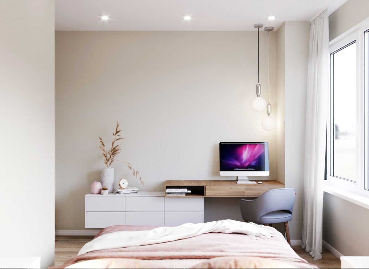 Trong phòng ngủ căn hộ nhỏ dưới 30m2, tủ kệ lưu trữ dạng nổi được thiết kế hợp nhất với bàn làm việc, giúp tiết kiệm diện tích đáng kể.