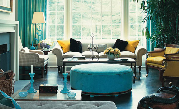 Việc sử dụng lặp lại màu sắc tạo ra nhịp điệu cho nội thất phòng khách.