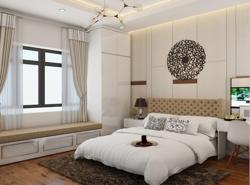 Phòng ngủ master của vợ chồng gia chủ được bài trí với bảng màu trung tính nhã nhặn, tạo cảm giác thư giãn cho người dùng.