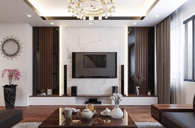 Bức tường đối diện sofa và bàn trà được decor đơn gian mà sang trọng, giúp tôn lên vẻ đẹp của đồ nội thất, thiết bị điện tử.