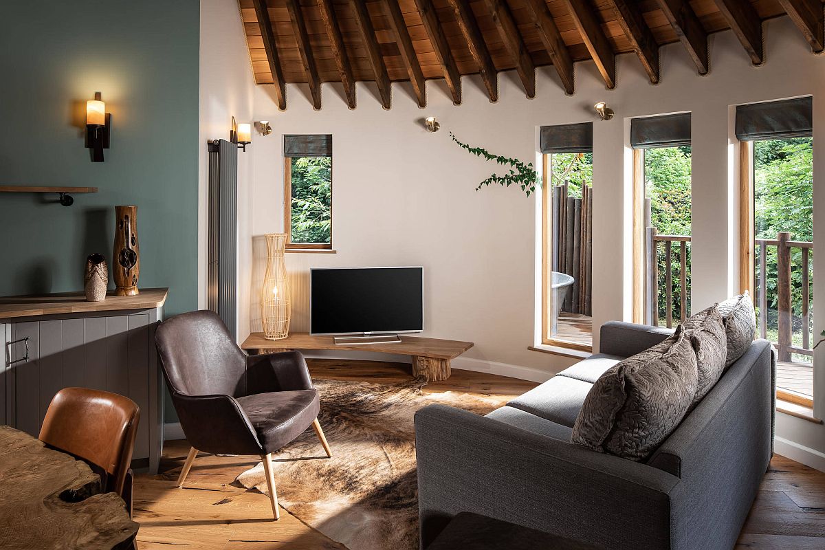 Mẫu thiết kế phòng khách nhỏ đẹp mỹ mãn với sự kết hợp ăn ý giữa nội thất Scandinavian và phong cách SoHo thông minh.
