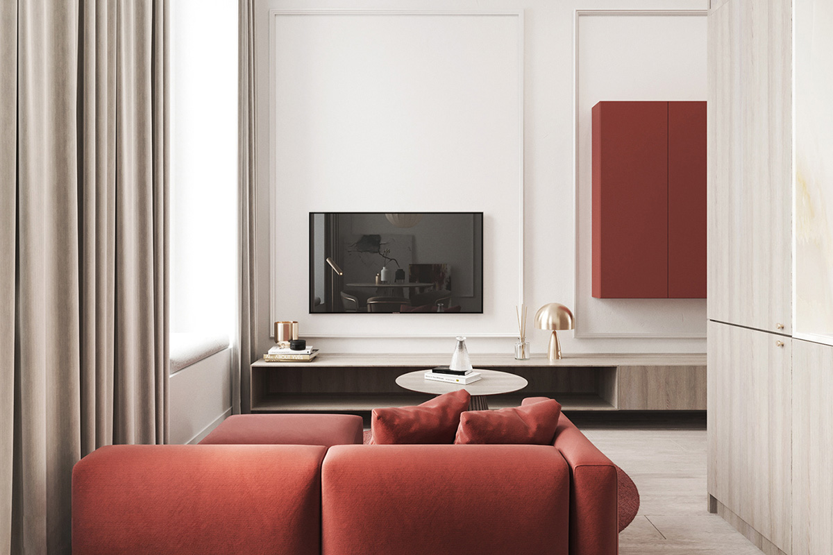 Một chiếc tủ tường màu đỏ từ hành lang nhìn ra góc nhà, phối kết chặt chẽ với bộ ghế sofa và thảm trải sàn màu đỏ.