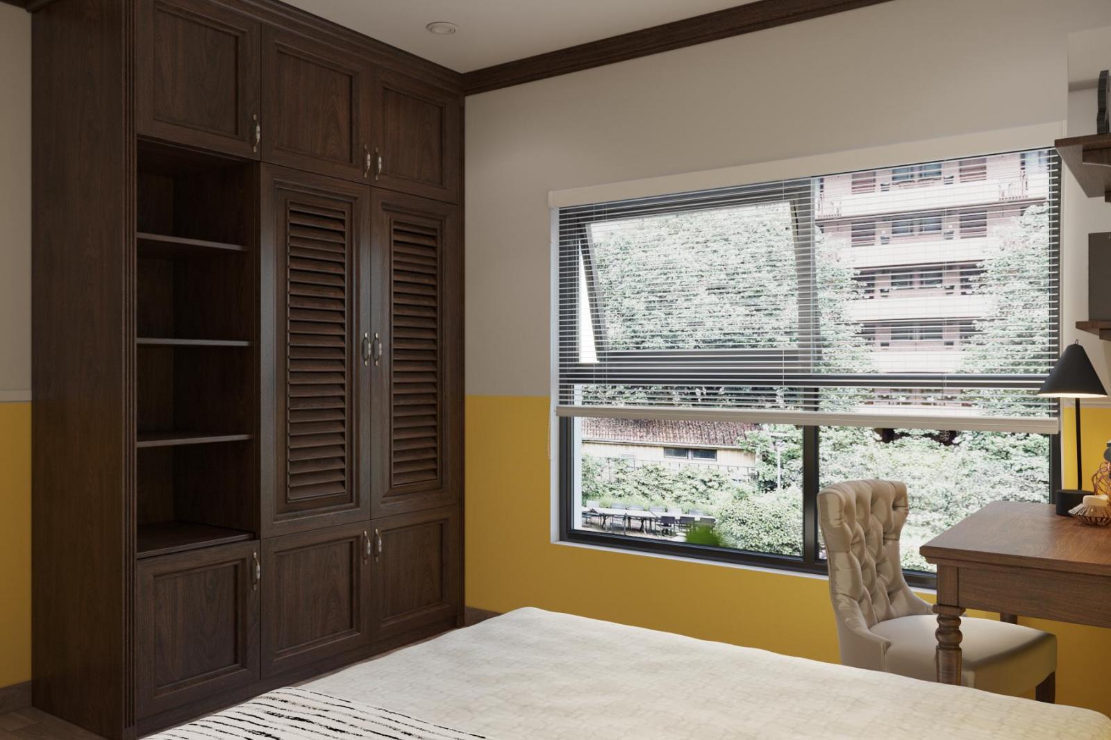 Sơn tường màu vàng kết hợp ánh sáng tự nhiên mang đến cho phòng ngủ căn hộ phong cách Indochine vẻ tươi mới, căng tràn sức sống.