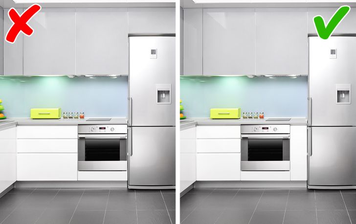 hình ảnh cận cảnh phòng bếp với tủ lạnh, tủ bếp tông màu trắng xám thanh lịch