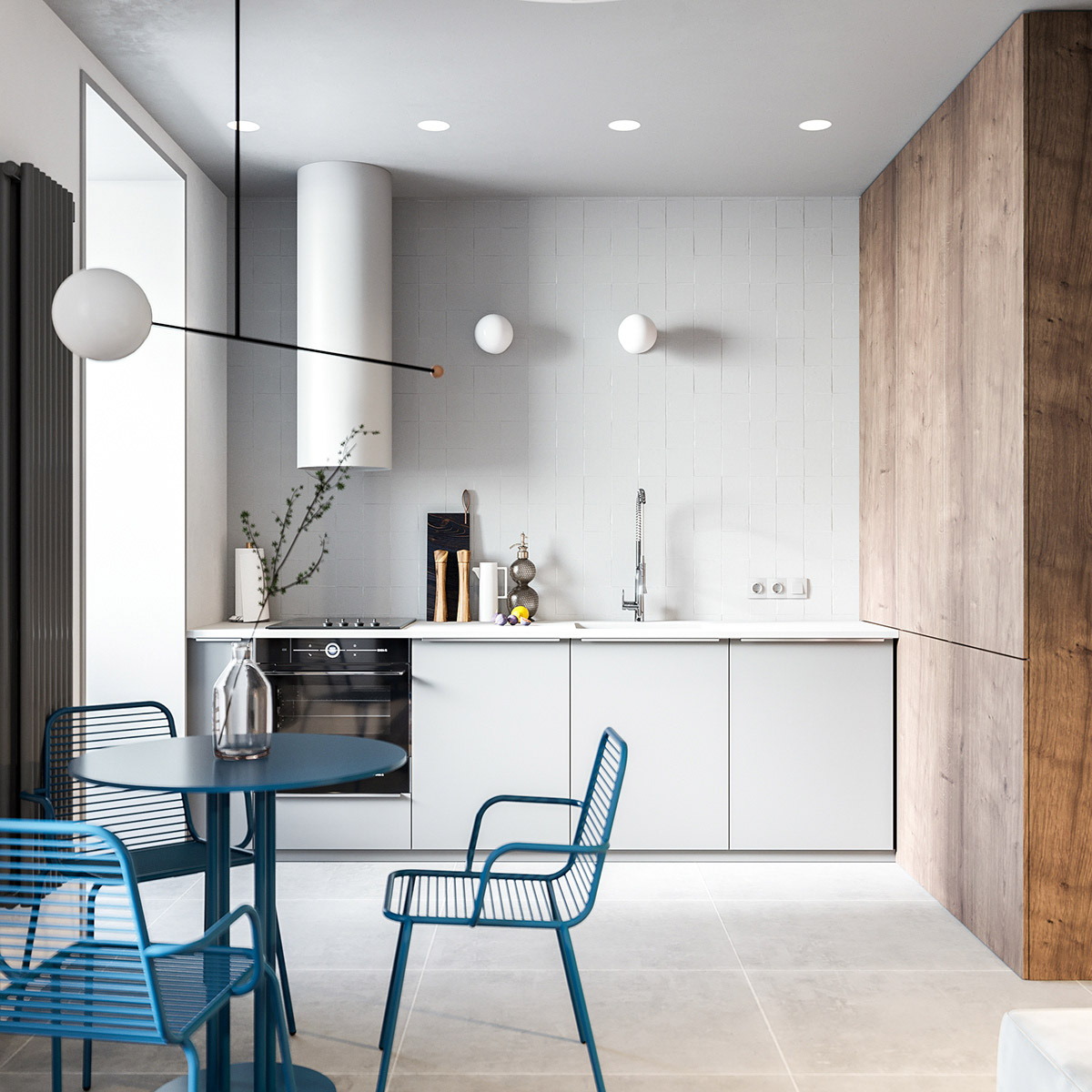 Phòng bếp với bức tường màu xám - trắng thanh lịch, tương phản với chất liệu gỗ tự nhiên ấm áp. Hai đèn treo tường hiện đại điểm xuyết trên nền tường ốp gạch.