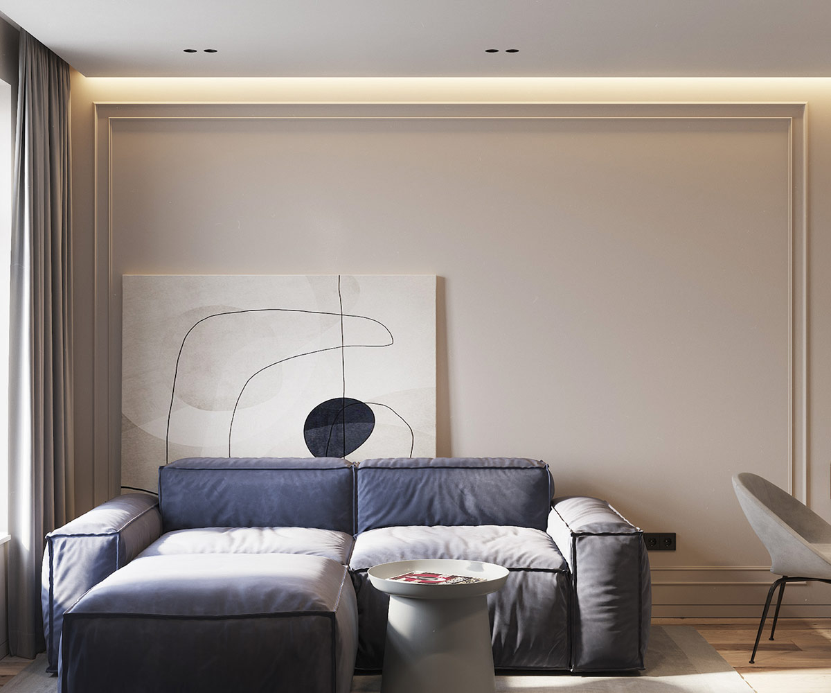hình ảnh phòng khách căn hộ 60m2 với ghế sofa màu tím nhạt, tranh nghệ thuật lớn dựa vào tường, bàn trà mặt tròn, chân khối trụ
