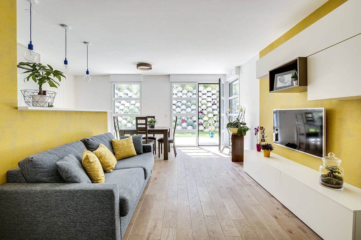 Phòng khách hiện đại kết hợp ăn ý giữa hai tông màu vàng - xám.