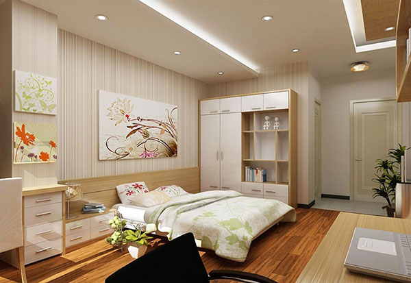 Phòng ngủ master của vợ chồng gia chủ mang hơi hướng cổ điển với nội thất gỗ màu sáng, giường thấp, tủ ngăn kéo cung cấp không gian lưu trữ thoải mái.