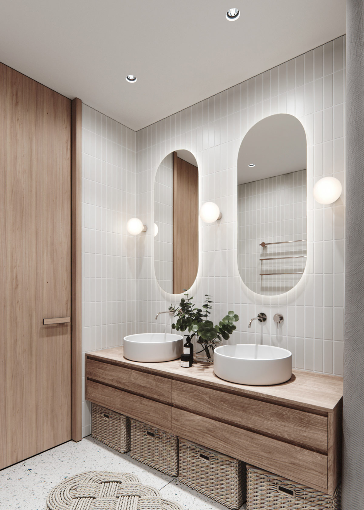 Đèn hình cầu đơn giản kết hợp với ánh sáng đèn LED bao quanh gương soi khiến phòng tắm bừng sáng lấp lánh.